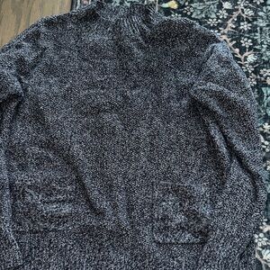 Woman’s blue speckled winter Sweater